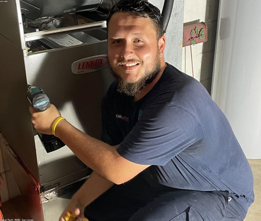 HVAC technician on a service call